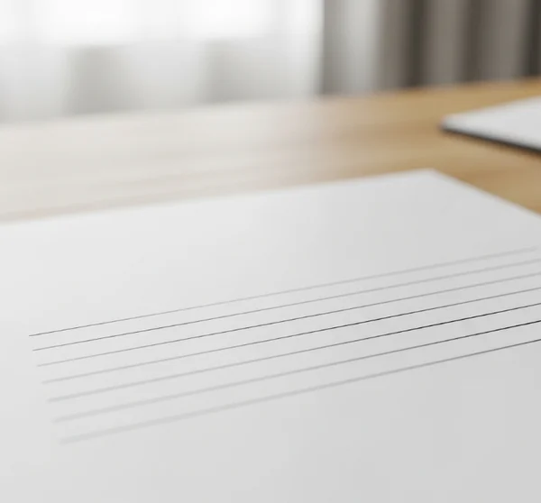 Blank guitar tablature paper showing six horizontal lines